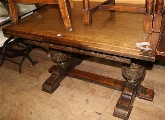 Jacobean style carved oak extending dining table